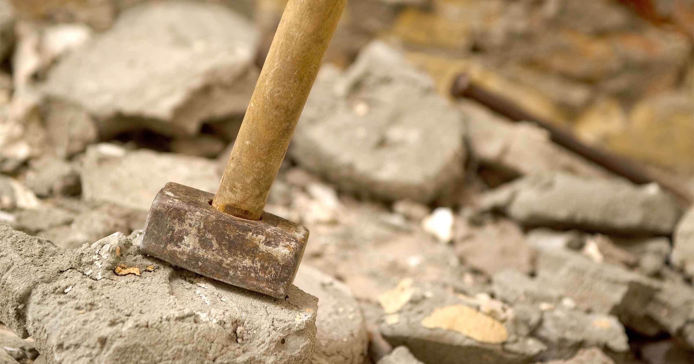 sledgehammer on broken concrete